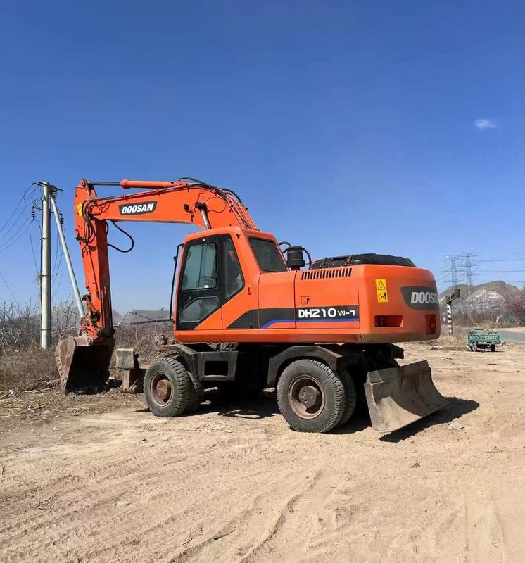 Kullanılmış Doosan DH210 Tekerlekli Kazıcı Hidrolik Sürüş ve Çalışma Ağırlığı İyi Kaliteli Kazıcı